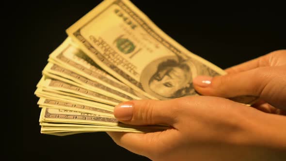 Female Proposing Bunch of Dollars, Currency Exchange, Illegal Business Deal