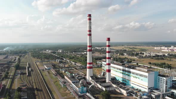 Aerial Photography of the Territory of the Thermal Power Plant with Chimneys Against the Sky
