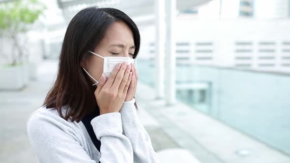 Young woman getting sick