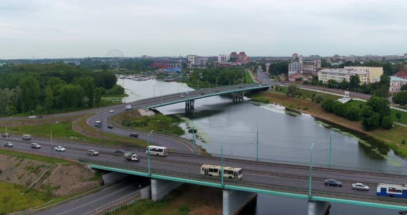 Cars Traffic Over the Bridge Across the River