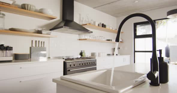 General view of luxury kitchen with sink and countertop