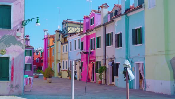 Houses Stand on Burano Street with Clothes on Clothesline