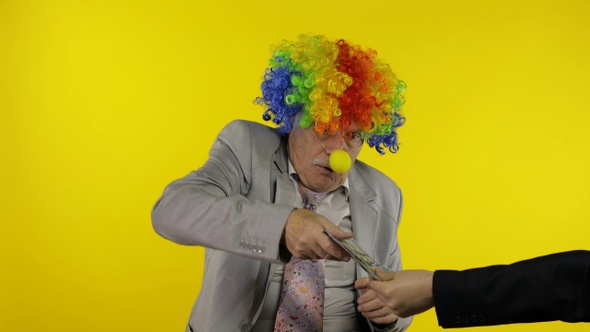 Elderly Clown Businessman Entrepreneur Boss Dancing, Entertains, Receive Money