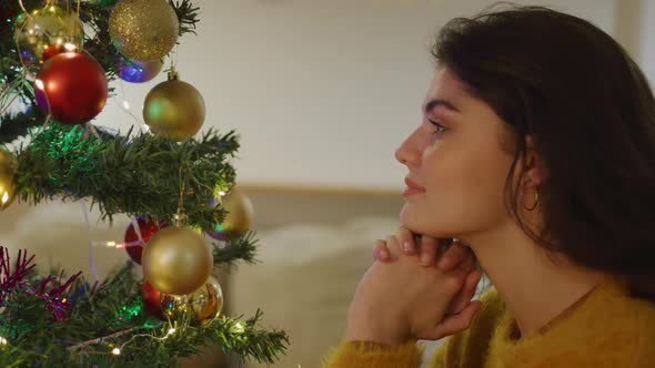 Young woman at home at Christmas