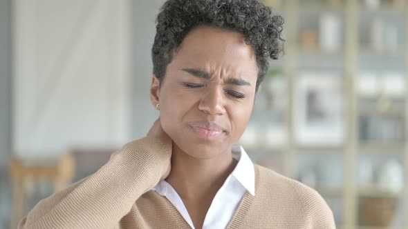 Portrait of Tired African Girl Having Neck Pain