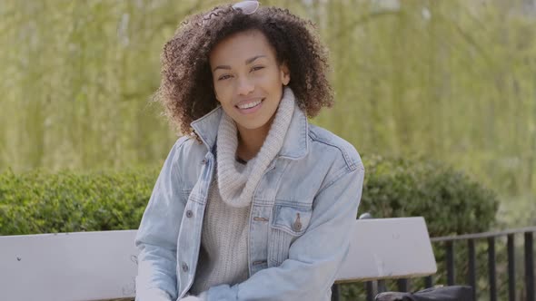 Spring or Sunny Autumn Outdoor Portrait of Beautiful Mixed Race Young Woman