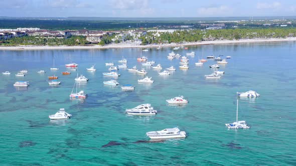 Caribbean Sea With Speedboats, Bavaro, Punta Cana, Dominican Republic - aerial drone shot