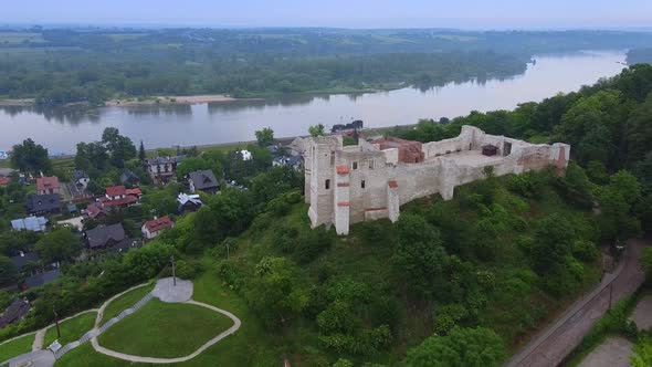 Zoom Shot of Historical Building Situated on Green Hill