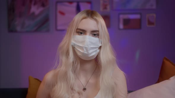 Young Teenager Woman Take Off and Drop Face Mask for Preventing Coronavirus Lockdown Millennial