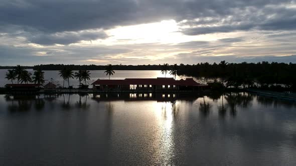 Beautiful sunset in Vembanad lake silhouette sky aerial view,resort,Asia tourism,sky