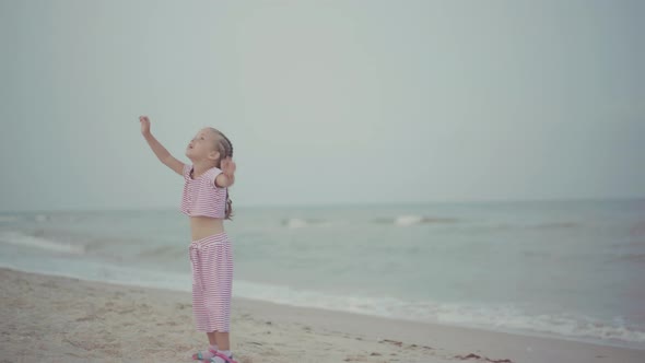 Mother with Little Daughter Playing Kite On Sea Beach Happy Caucasian Family With One Child Have Fun