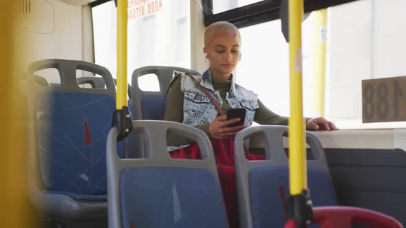 Mixed race woman taking the bus