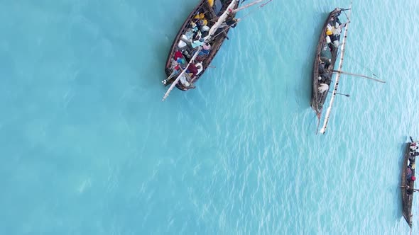 Vertical Video Boats in the Ocean Near the Coast of Zanzibar Tanzania Aerial View