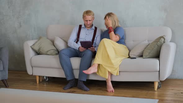 Male with Mature Mom Playing Online Games at Home