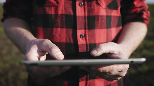 Smart Agriculture Technology Farmer Holding Tablet with Smart Technology