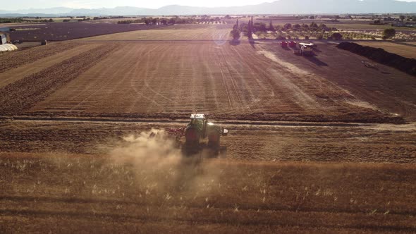 Combine Harvester Harvesting Wheat Field