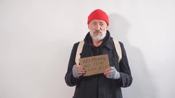 Homeless Man Holding Sign Request for Help Seeking Help Posing at Studio