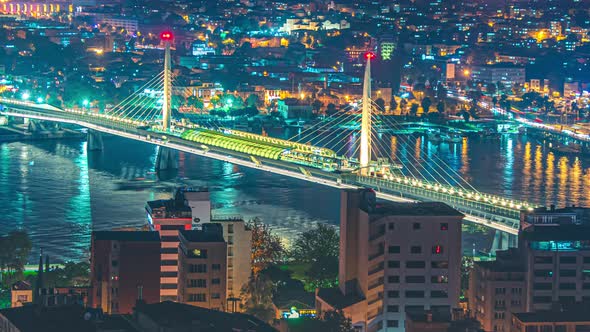 Timelapse Ataturk bridge, metro bridge and golden horn at night in Istanbul, Turkey