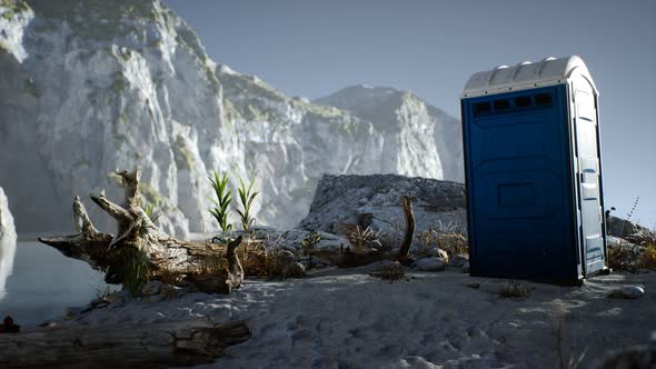 Portable Mobile Toilet in the Beach. Chemical WC Cabin