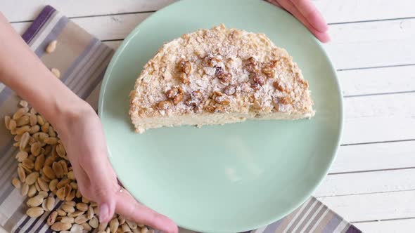 Cake with Nuts on a Light Background