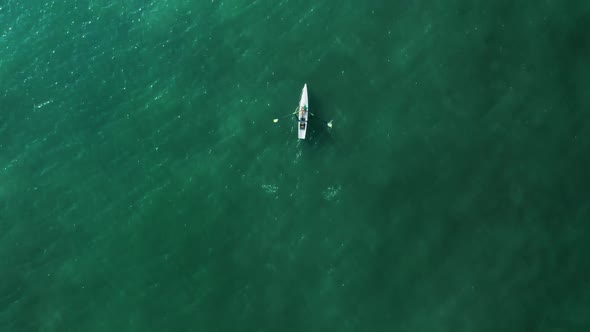 Beautiful Scenery of a Vessel Within Turquoise Sea Waters