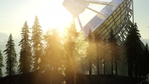 The Observatory Radio Telescope in Forest at Sunset