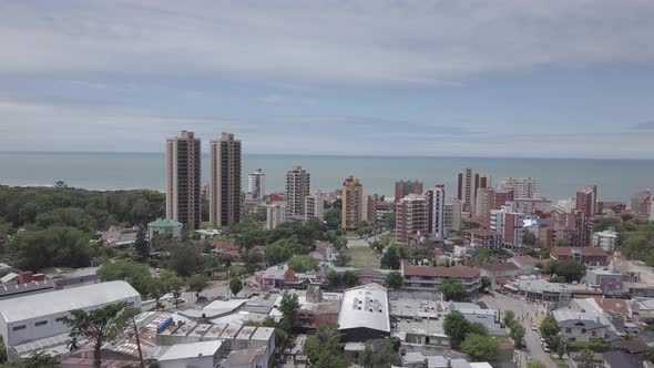 Drone shot of holiday town in the coast in summer