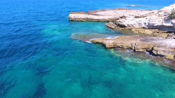 Rocky and Stony Seashore in Untouched Sea