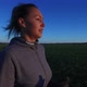 Slow Motion: Female Runner Across Countryside Fields On Sunny Morning - VideoHive Item for Sale