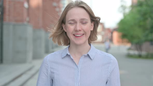 Portrait of Woman Talking on Online Video Call Outdoor