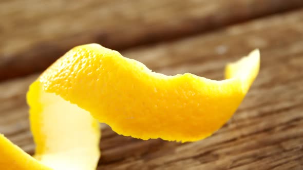 Sweet lime peel on wooden plank