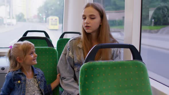 Exhausted Mother Fall Asleep and Missed Stop Station in Tram Kid Daughter Wakes Tired Sleepy Woman