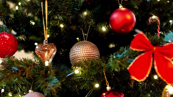 Snow Falling Overchristmas Decorations on Fir Tree