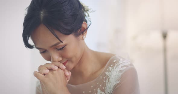 Slow Motion Smiling Beautiful Asian Bride In Wedding Dress Praying To The God.