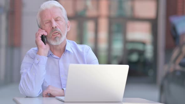 Outdoor Old Man Talking in Smartphone