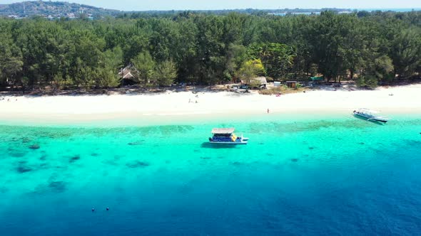 Aerial seascape of tropical island beach holiday by transparent water and bright sand background of 