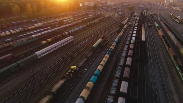 Flight of the Copter Through the Railway Sorting Station at Sunset