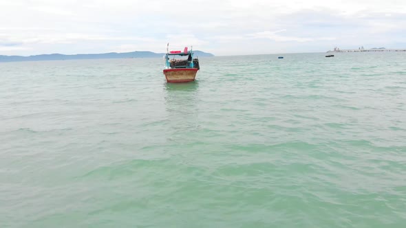 Professional Fishing Vessel, Shooting From Drone of an Asian Fishing Schooner a Boat with Crab Traps