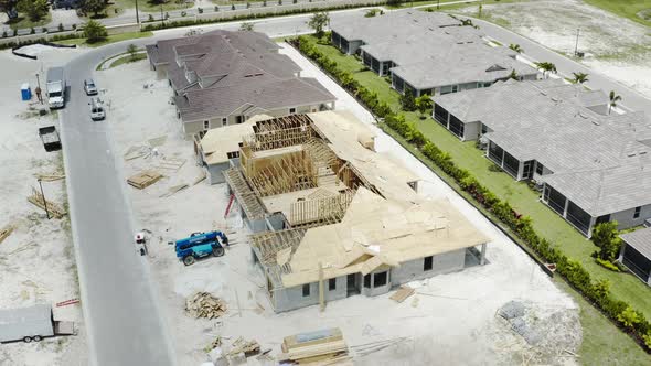 Aerial Drone Shot of New Residential with Wooden Truss Post and Beam Stick Built Construction