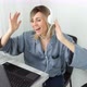 Attractive european blonde woman in headphones listening music and dancing sitting on comfy chair - VideoHive Item for Sale