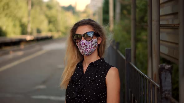 Woman In Mask Protection Epidemic Coronavirus On Public Transport Station. Girl Waiting Train.