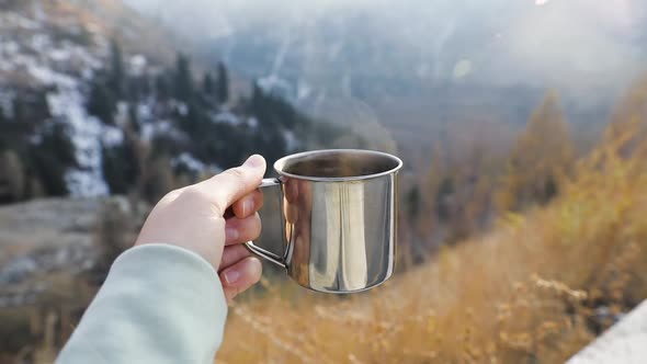 Cup with Hot Beverage and Steam