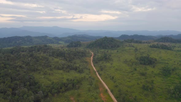 Aerial view of national park green field mountains in Thung Yai Naresuan Wildlife Sanctuary,