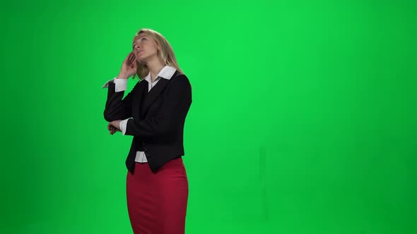 Blond Female Looking Upset Standing Against Green Screen Chroma Key Background