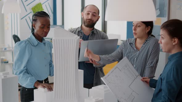 Team of Diverse People Working Together to Design Building Model and Architecture Project