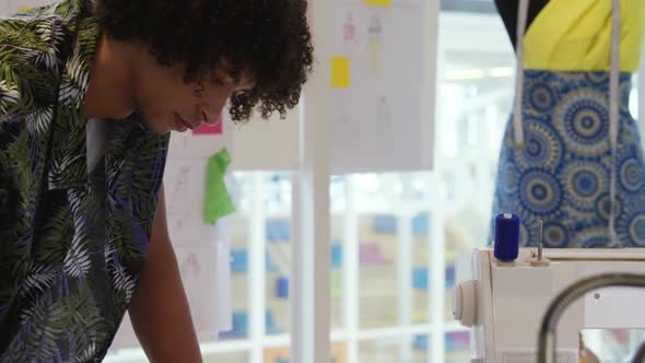 Young man working in a creative office