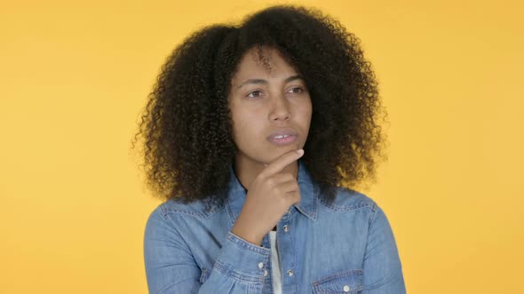 African Woman Thinking Getting Idea Yellow Background