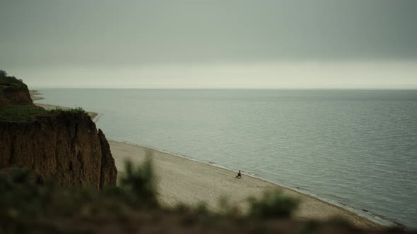 Scenic View Coastline with Sandy Hill Gloomy Day