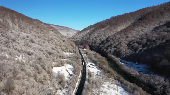 The Car in Winter on Way Aerial View