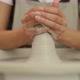 Artisan Shaping Clay Vessel on Pottery Wheel - VideoHive Item for Sale